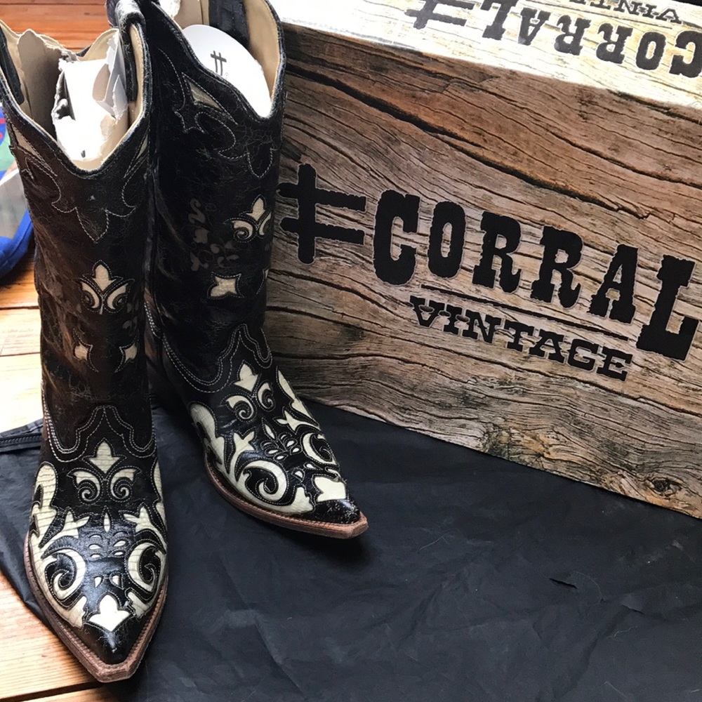 Cow and lizard cowgirl boots.